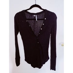 Urban outfitters black V-neck with Buttons.